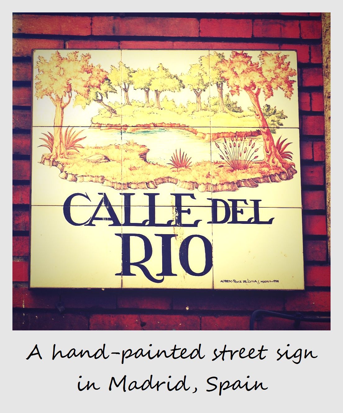 polaroid of the week spain madrid street sign calle del rio