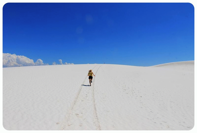 Dani running in White Sands